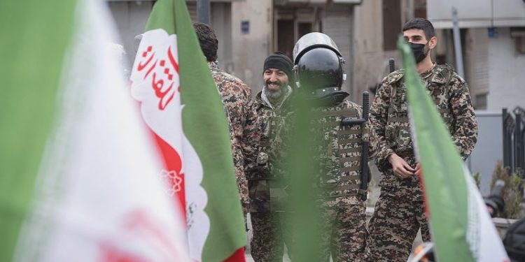 Iran president vows defiance as protests build against regime amid US military build up